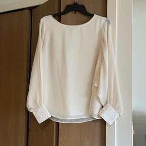 Jennifer Lopez Slit Sleeve Top